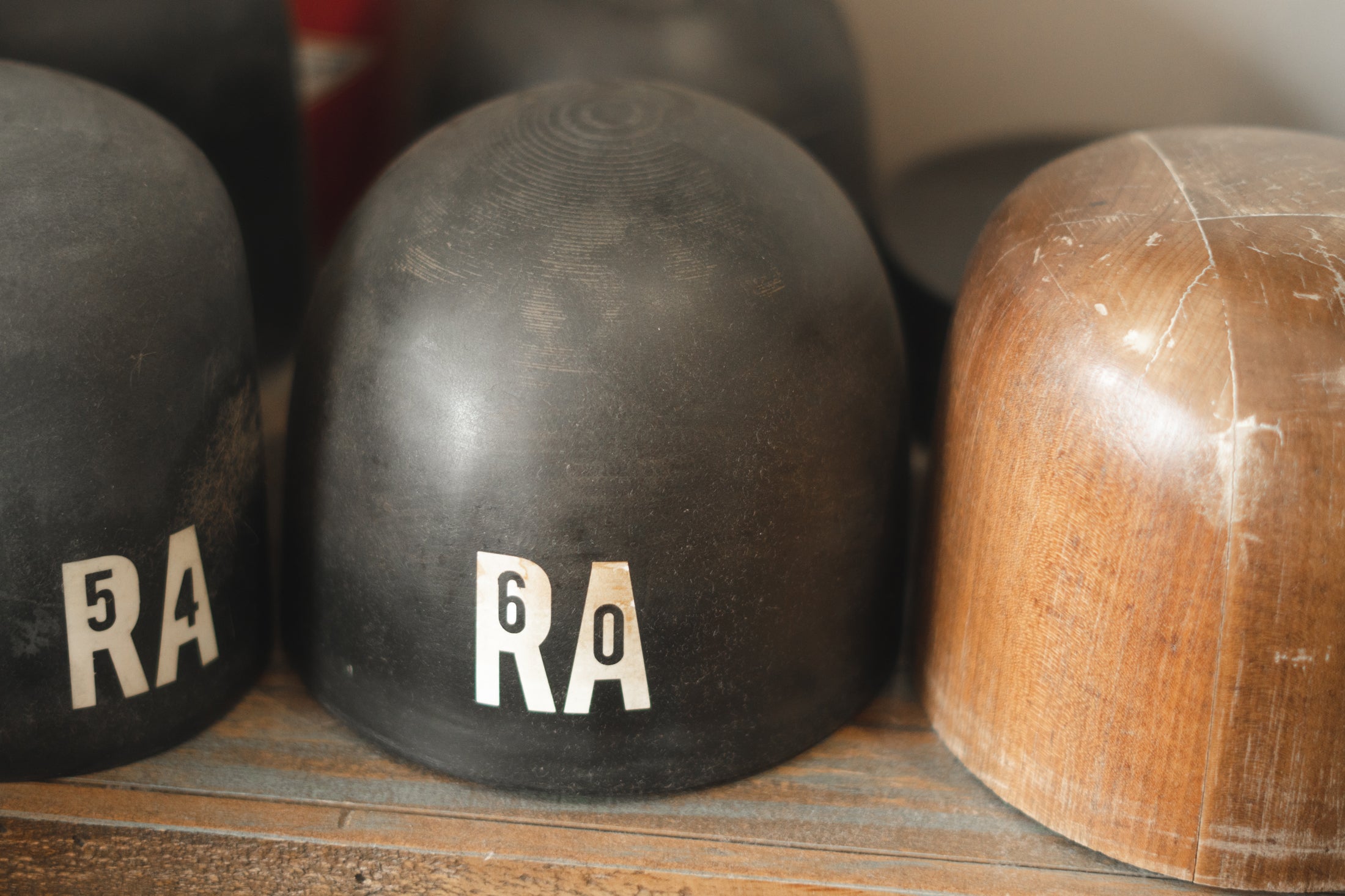 Hat blocks sitting on a table.
